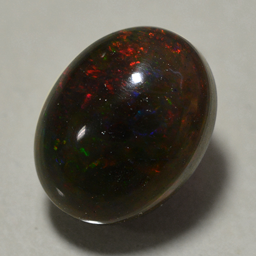 0.9 Carat Multicolor Black Opal Gem from Ethiopia