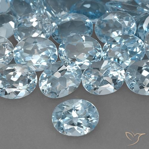 9.1 x 7.1mm Oval Baby Blue Topaz - Weight avg. 2.31ct each, 9.1 x 7.1mm Topaz selling By Piece, Color: Baby Blue, Clarity: VVS-VS, Natural Gemstone, Mohs Hardness 8 suitable for daily wear jewelry, Golden Stone, Photo A